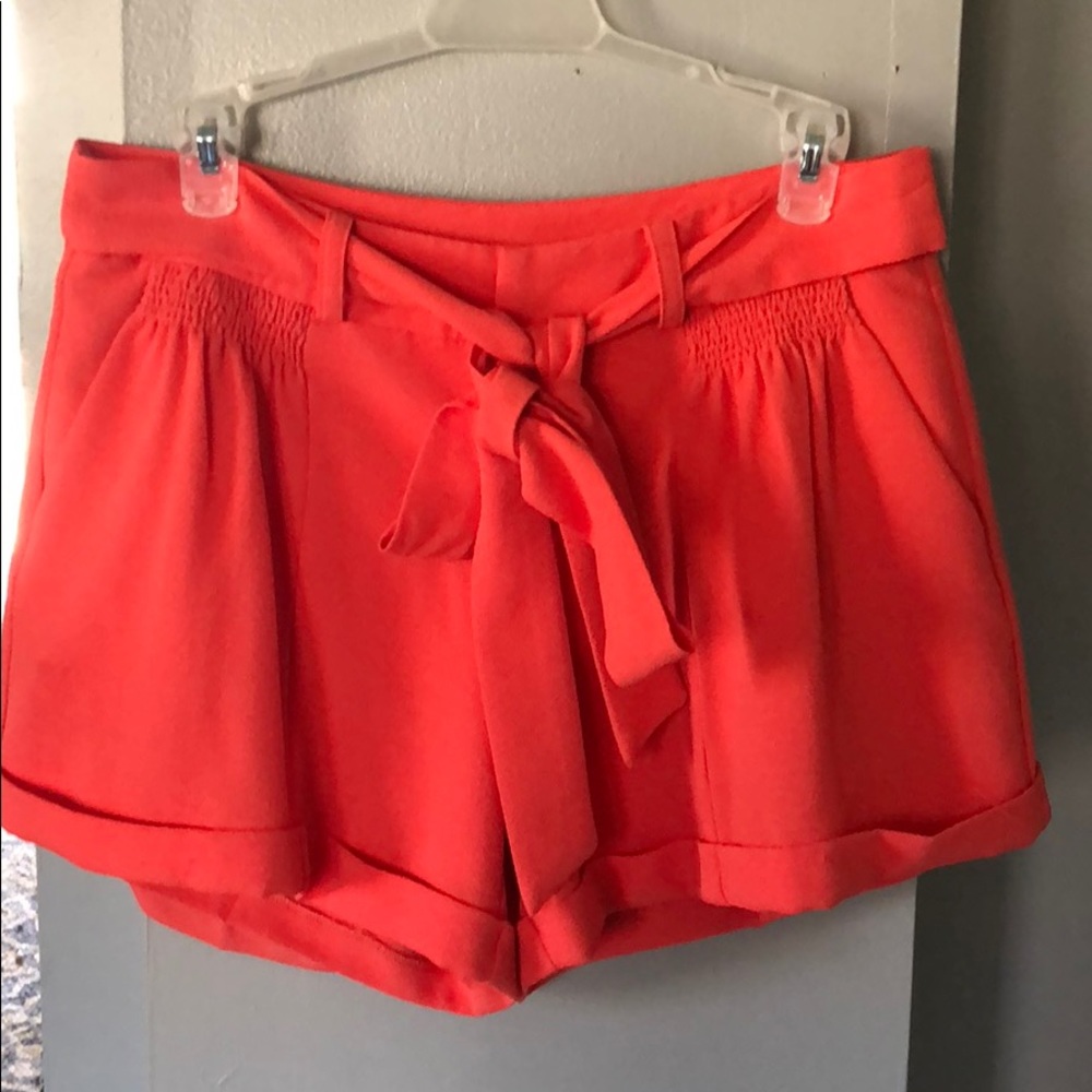 5|48 Coral shorts.